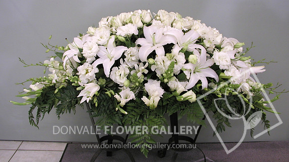 casket flowers - white mix